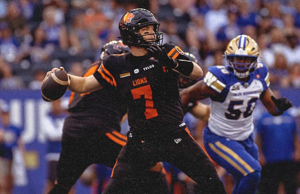 BC Lions quarterback Chase Brice readies a pass.
